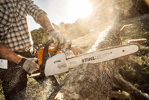 Stihl Chainsaw Cutting Log